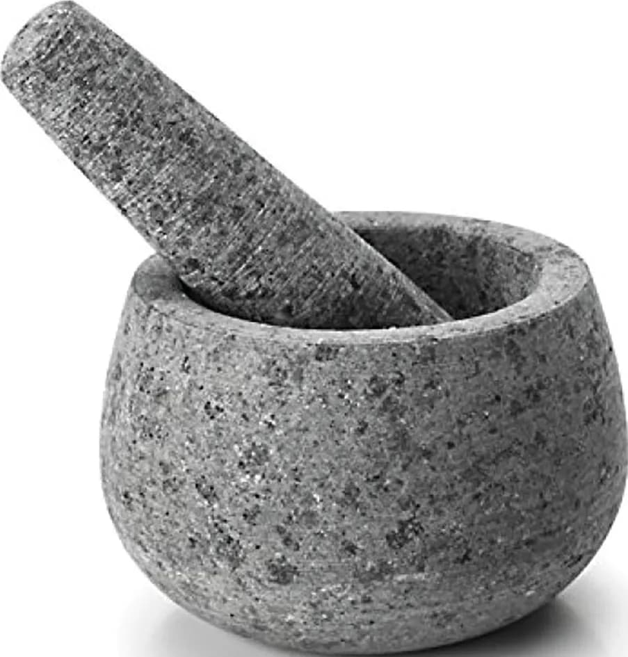 Mortero cocina con mano granito con mano