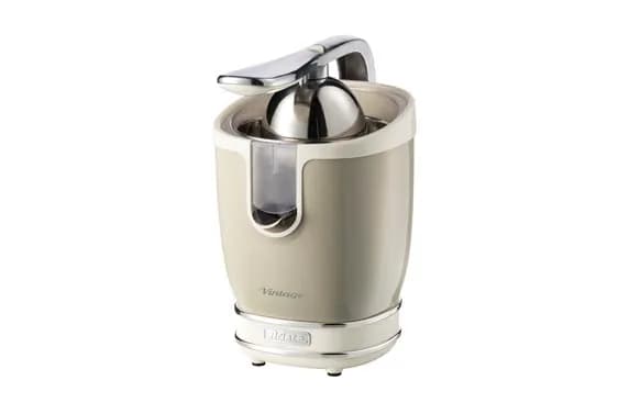 Exprimidor con brazo vintage beige